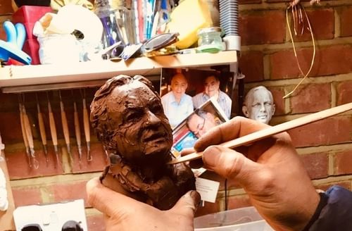 Alessandro Cervizzi working on a clay bust