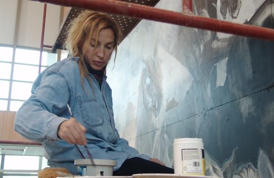 Angela Leible at work large scale painting