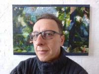 HSoA tutor seated in front of painting